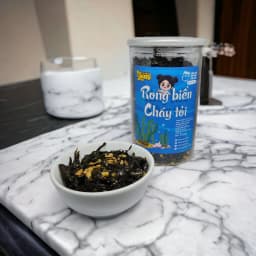 Thumbnail Rong biển cháy tỏi Trạm ngọt Yumi sấy khô thơm đậm vị ăn vặt ăn cơm đều ngon 150g 1